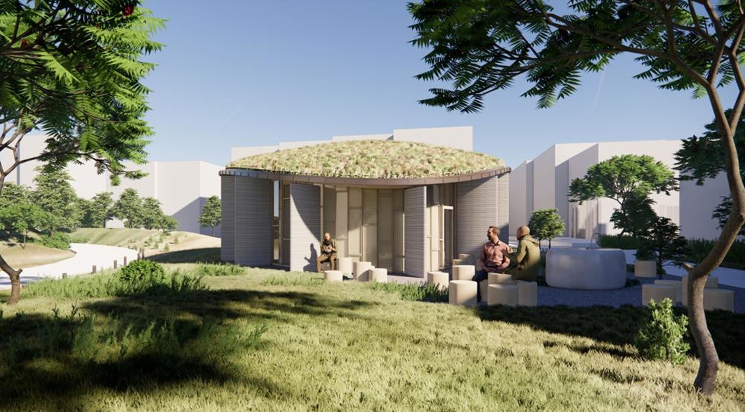 Billedet viser en illustration af det fælleshus i beton, som skal opføres ifm. projektet.