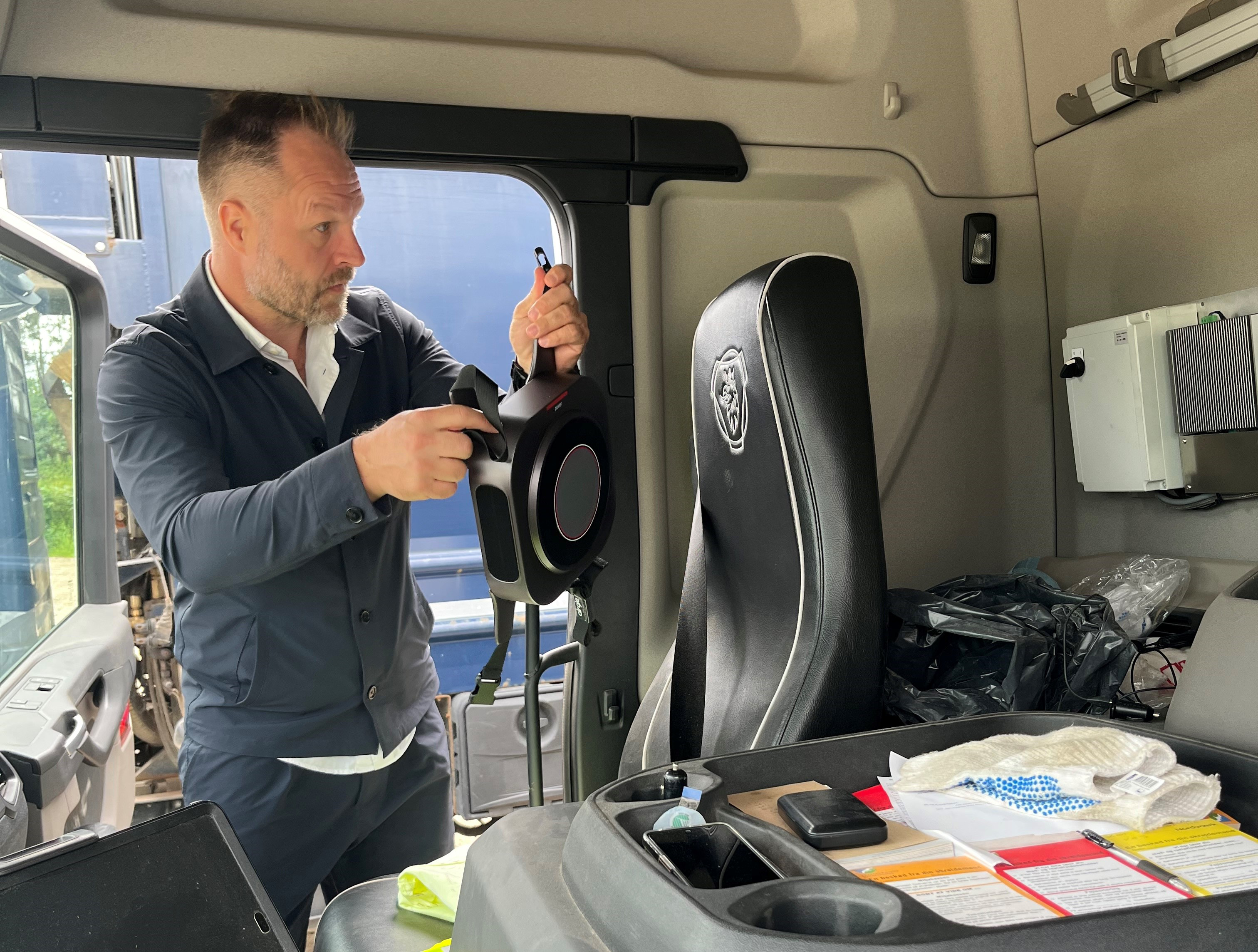 Luftrenser i skraldebil i frerhuset