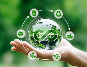 The picture shows a hand holding different energy symbols