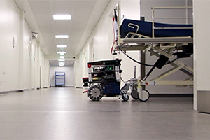 Robot tr�kker seng p� sygehus